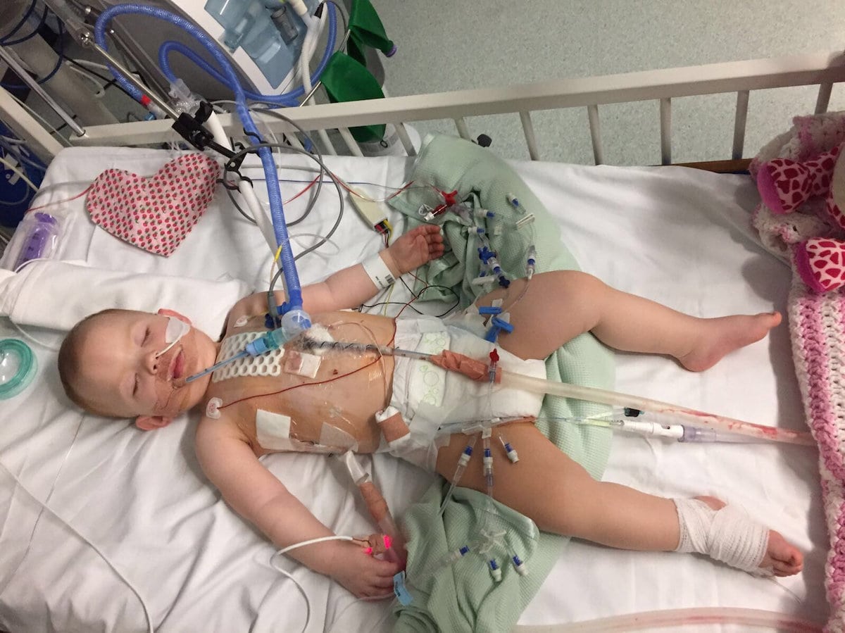 Mum of a baby born with a hole in her heart has hit out at the Government after a life-saving op was cancelled FIVE times