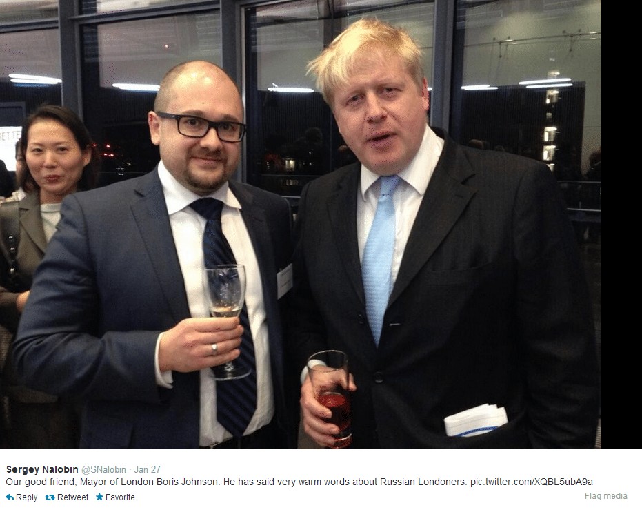 Photo emerges of Russian exposed as spy with “good friend” Boris Johnson