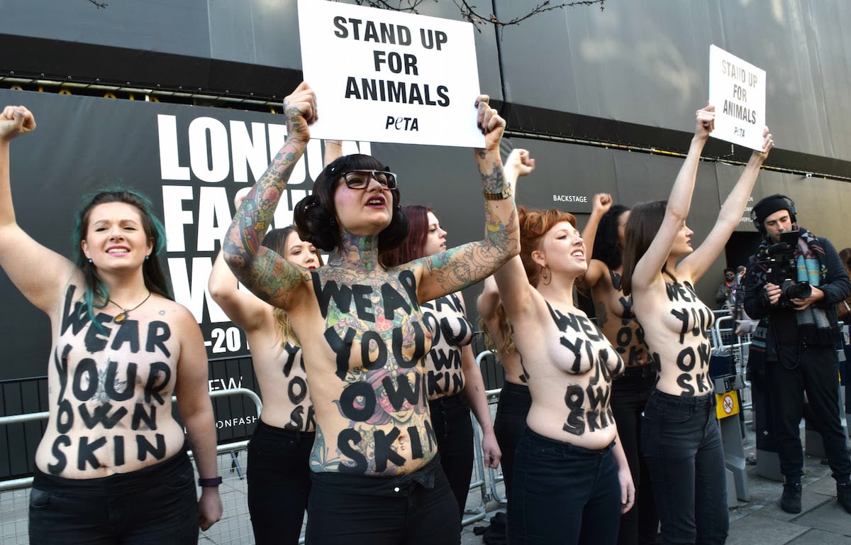 Topless activists stage radical vegan protest at London fashion week