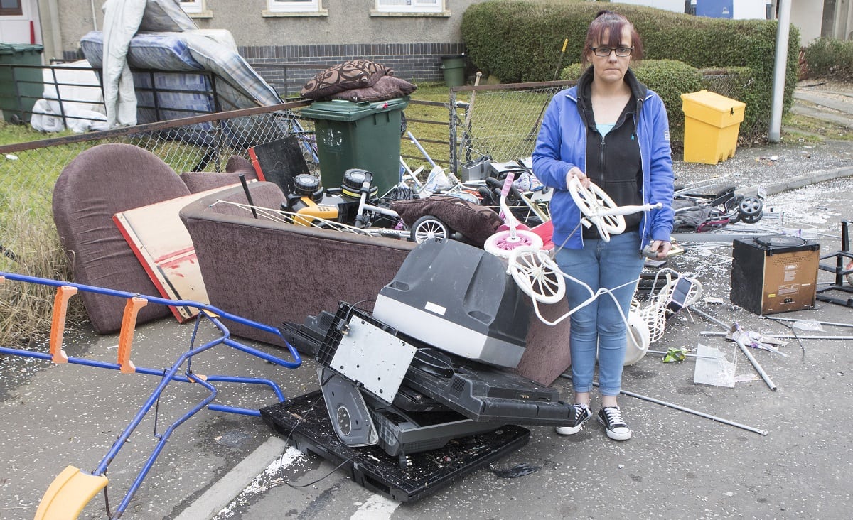 Mother comes home to find all her possessions thrown on the street by heartless landlord