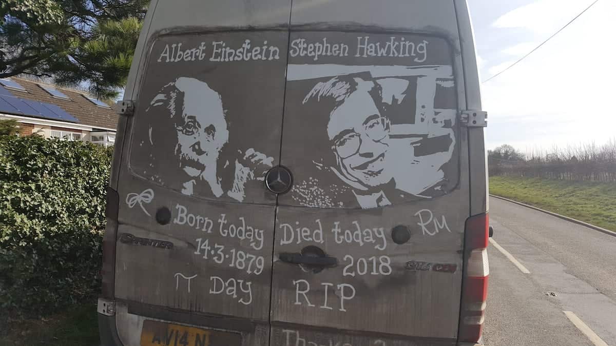 White van man pays tribute to the late Professor Stephen Hawking by drawing a picture of him on the back of his muddy flower delivery vehicle