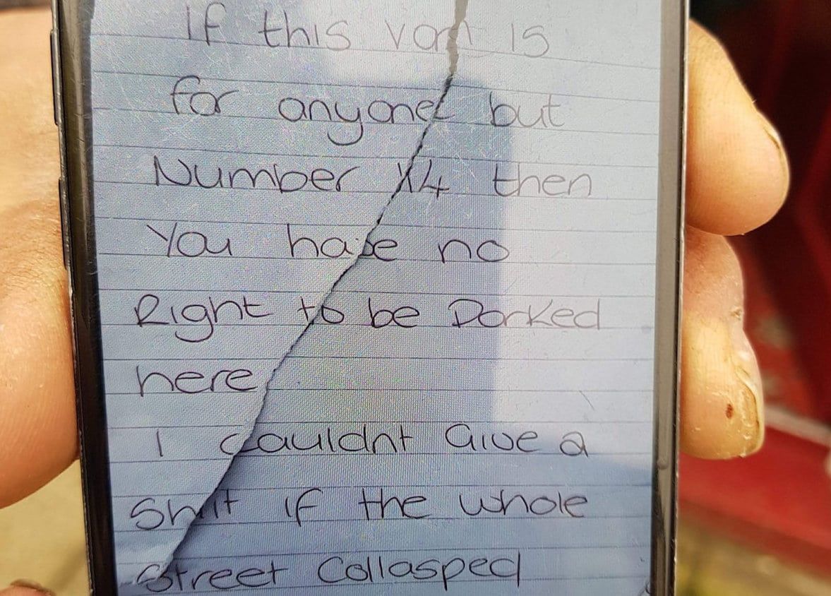 Please note mandatory credit WMAS / SWNS.com

Paramedics were left stunned after finding this note demanding they moved their ambulance during a 999 call with the message:"I don't give a sh*t if the whole street collapses". See News team story NTINOTE; The angry message was written by a woman who was annoyed that an ambulance was in a resident's parking bay on Sunday morning (18/2). West Midlands Ambulance Service said the resident also verbally abused staff members during the emergency call-out in Tunstall, Stoke-on-Trent, Staffs. The note read: "If this van is for anyone but No.14 then you have no right to park here.