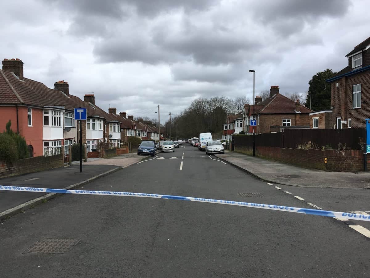 A suspected burglar was stabbed to death and a 78-year-old who lived in the property was arrested