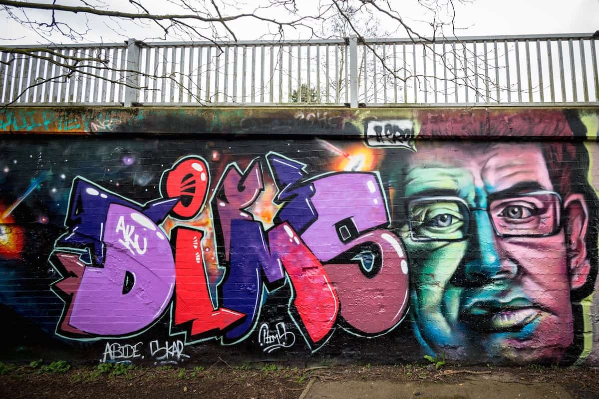 An incredible graffiti tribute to Stephen Hawking painted across a bridge in Cambridge