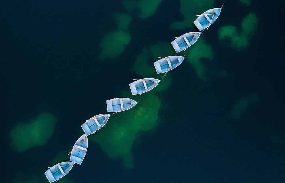 Breathtaking aerial photos make boats on lake look like tiny toys