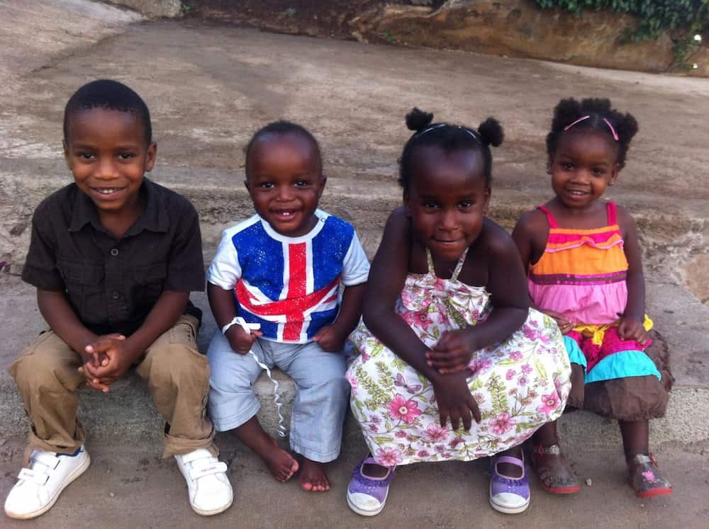 British woman who adopted FOUR Tanzanian children is now battling to get them to UK