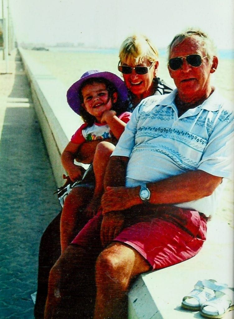 Collect of Brenda with her late husband Brian and granddaughter in Dubai. See NTI story NTIROYAL. A grandmother who is 18th cousin of the Queen is facing being deported back to South Africa after she was refused a visa to live in the UK. Brenda Ackerman, 71, traced her family tree back to the 12th Century which revealed her to be a distant relative of King John James 1st and Robert the Bruce. Mrs Ackerman was born in South Africa but fled in 2006 with her husband Brian after a string of burglaries. They moved to Dubai to be with their daughter Candice Gordon, 45, before finally settling in the UK in 2013 following the death of Mrs Ackerman’s husband Brian. Last February, Mrs Ackerman applied for a long-term visa but it was turned down, despite her suffering from a pulmonary embolism and being in failing health. Mrs Ackerman’s daughter has been granted permission to remain in the UK but the widow has now been informed she will be deported unless she returns to South Africa voluntarily. Mrs Ackerman, who currently lives with her daughter in Worcester, said: “My descendants were British.