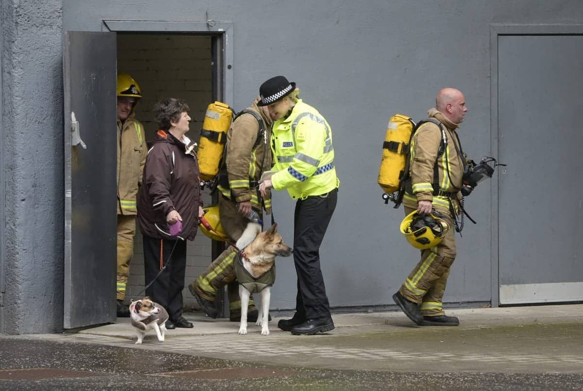 Firefighters tackling a blaze at the top of a high rise building in Glasgow