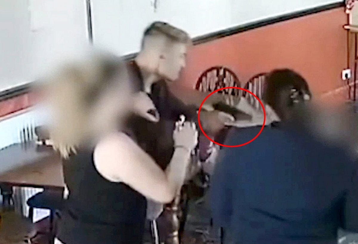 Moment cage fighter appears to pull out gun and stick in love rival’s mouth