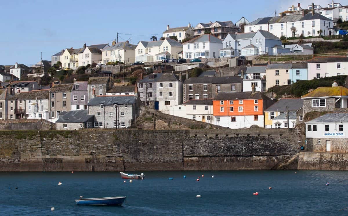 Locals who have been priced out of their pretty fishing village have voted to ban second-home owners from buying new builds in a landslide victory.  Mevagissey, in Cornwall, has seen a boom in the number of houses being purchased as holiday homes over recent years.