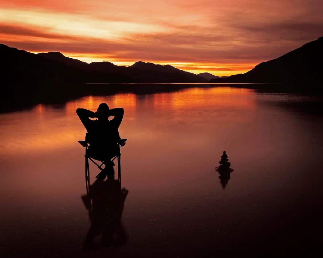 Dad-of-two captured amazing picture of a golden sunset – sitting on deck chair in Loch Lomond