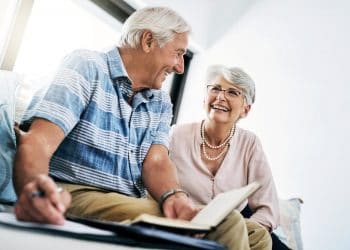 Shot of a senior couple going through their paperwork together at home