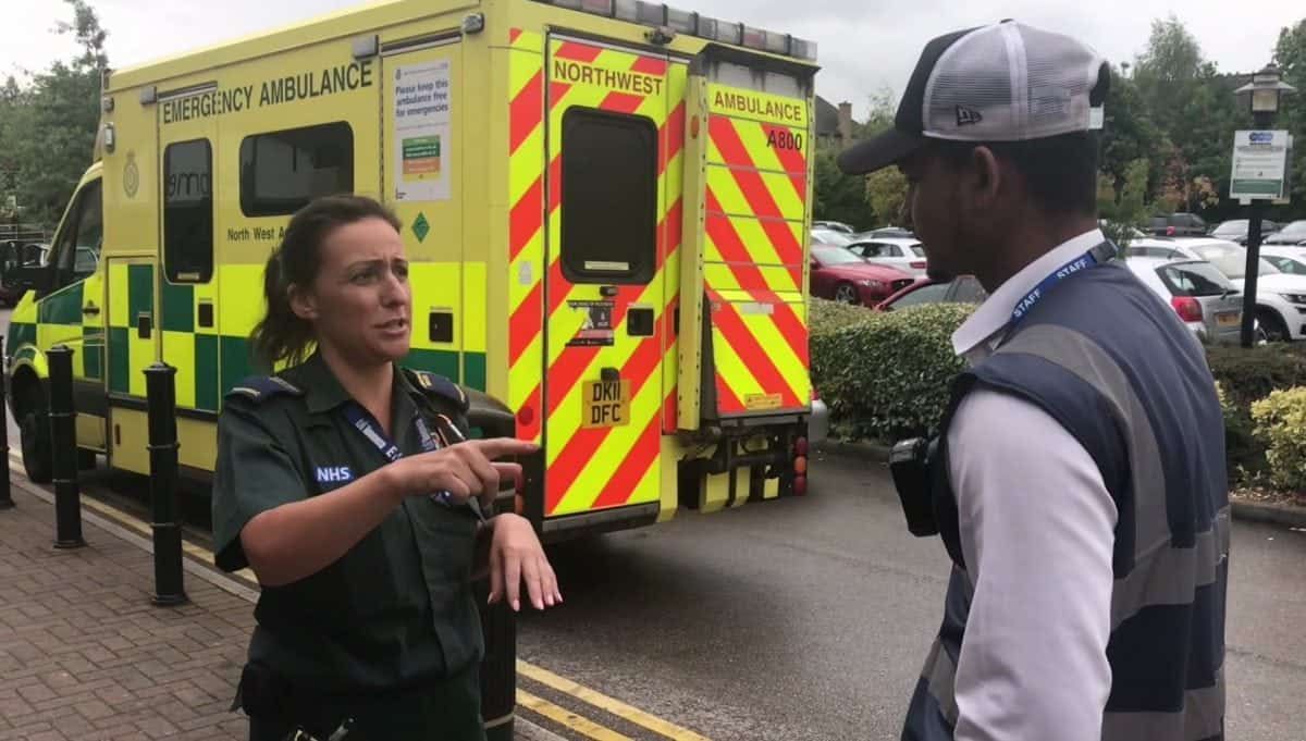 Watch – Shocking moment a ticket warden fines an ambulance for parking on double yellows