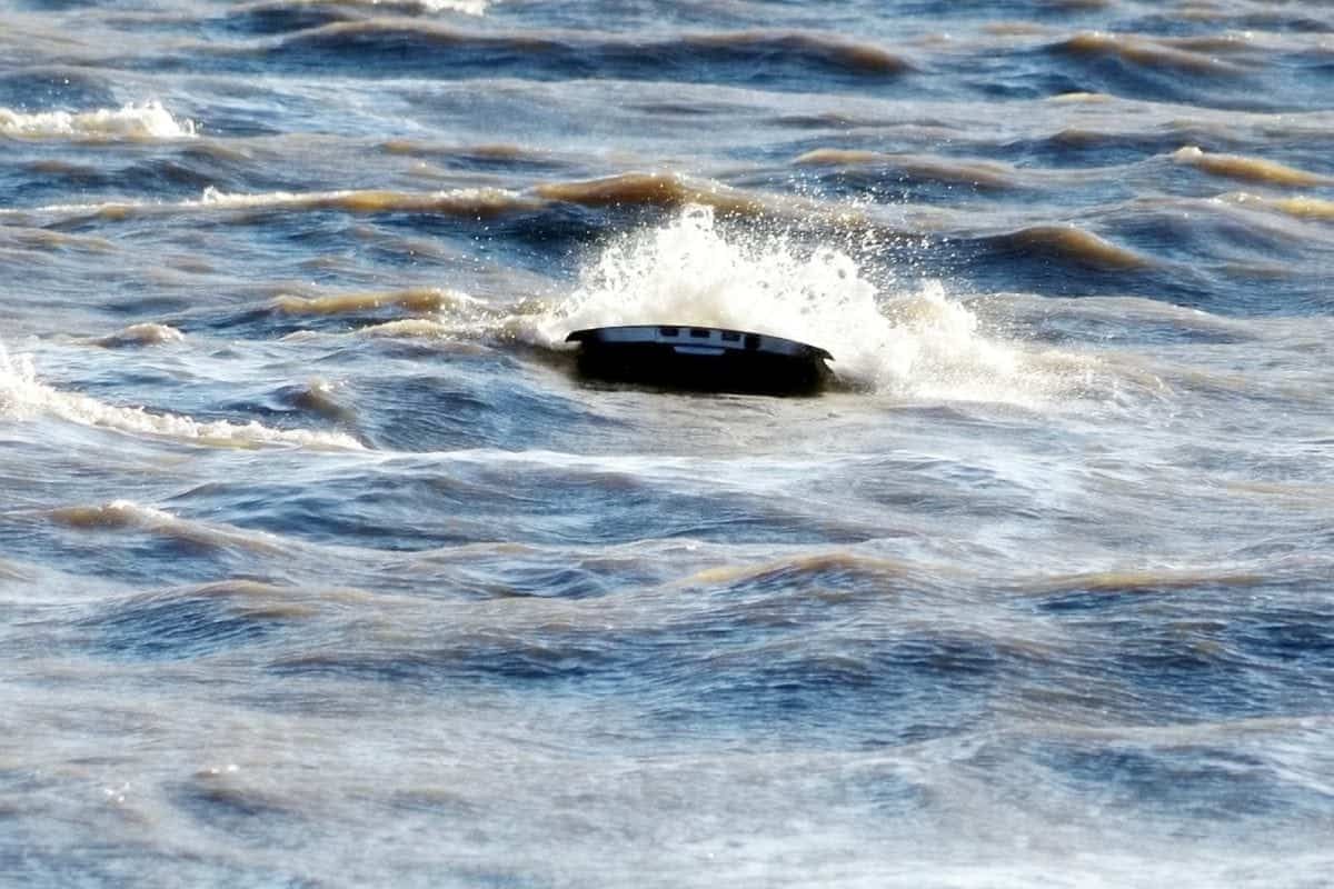 Family rescued after car swamped by the sea