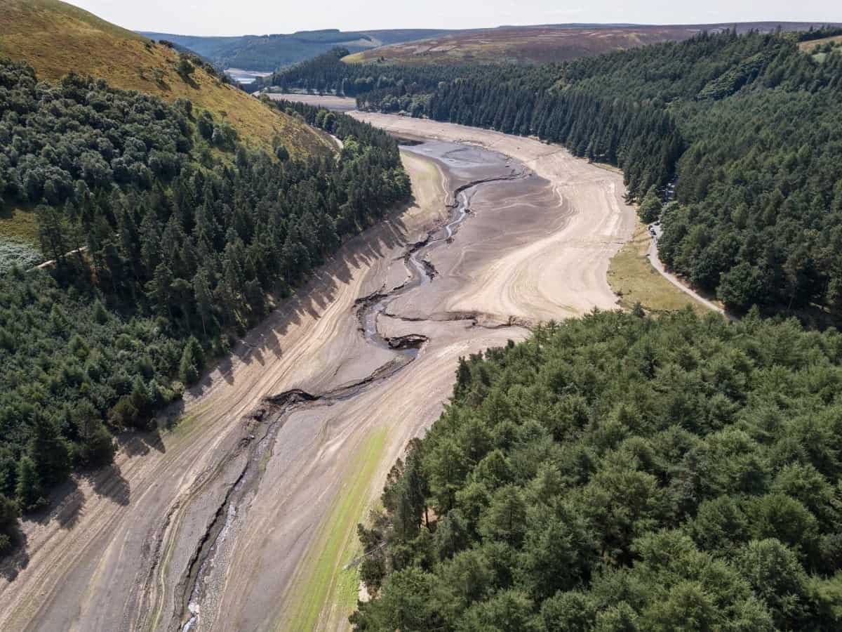 Aerial view of Howden Reservoir lays bare the stark landscape of Britain’s parched land