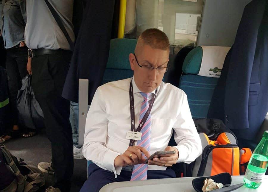 Shocking moment rail chief takes up 2 seats in 1st class as prevents economy class passengers from sitting down