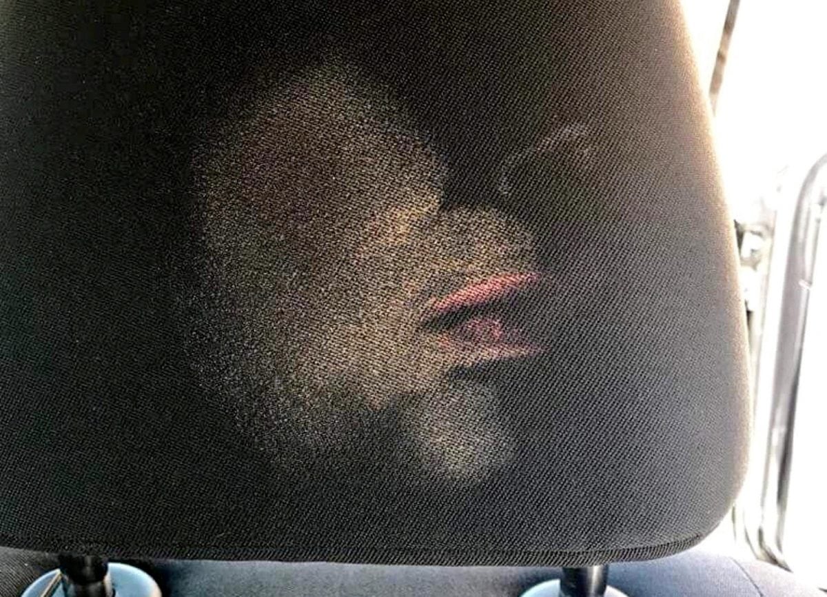 Taxi passenger’s face imprinted on back of driver’s headrest