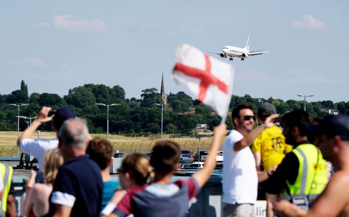 England players receive heroes welcome as hundreds of fans greet them at Birmingham Airport