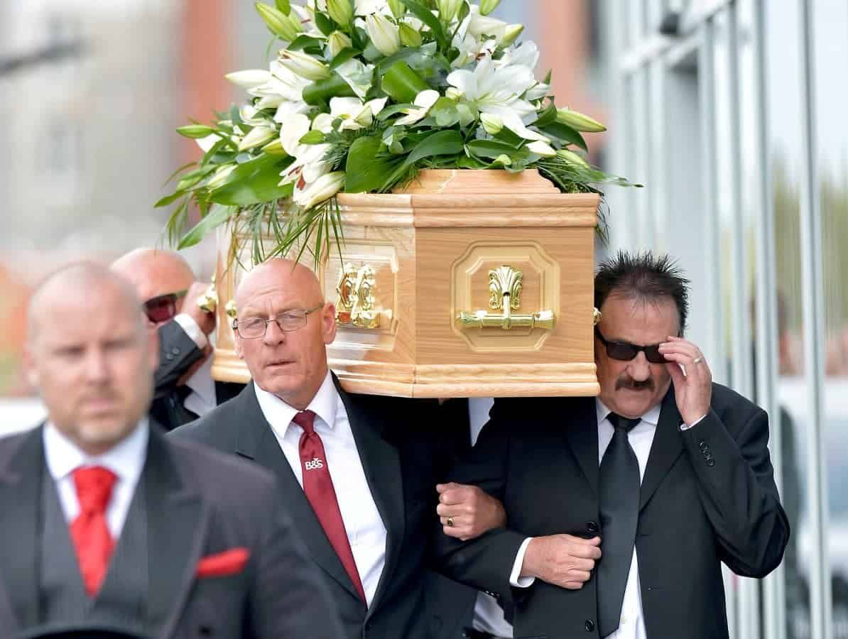 Hundreds of mourners line the street to pay tribute to Barry Chuckle