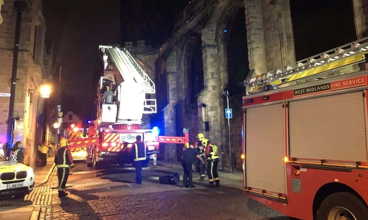 Dramatic pics show fire crews rescuing two drunk revellers from top of Coventry Cathedral