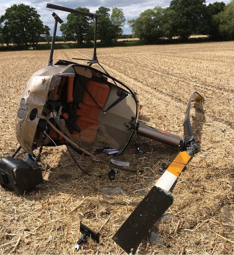 Man & woman cheat death in helicopter crash