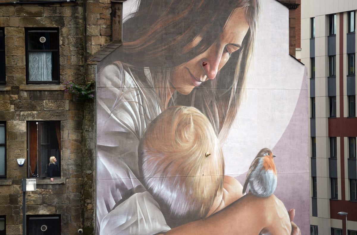 Mural depicting the patron saint of Glasgow by Australian artist Smug is unveiled