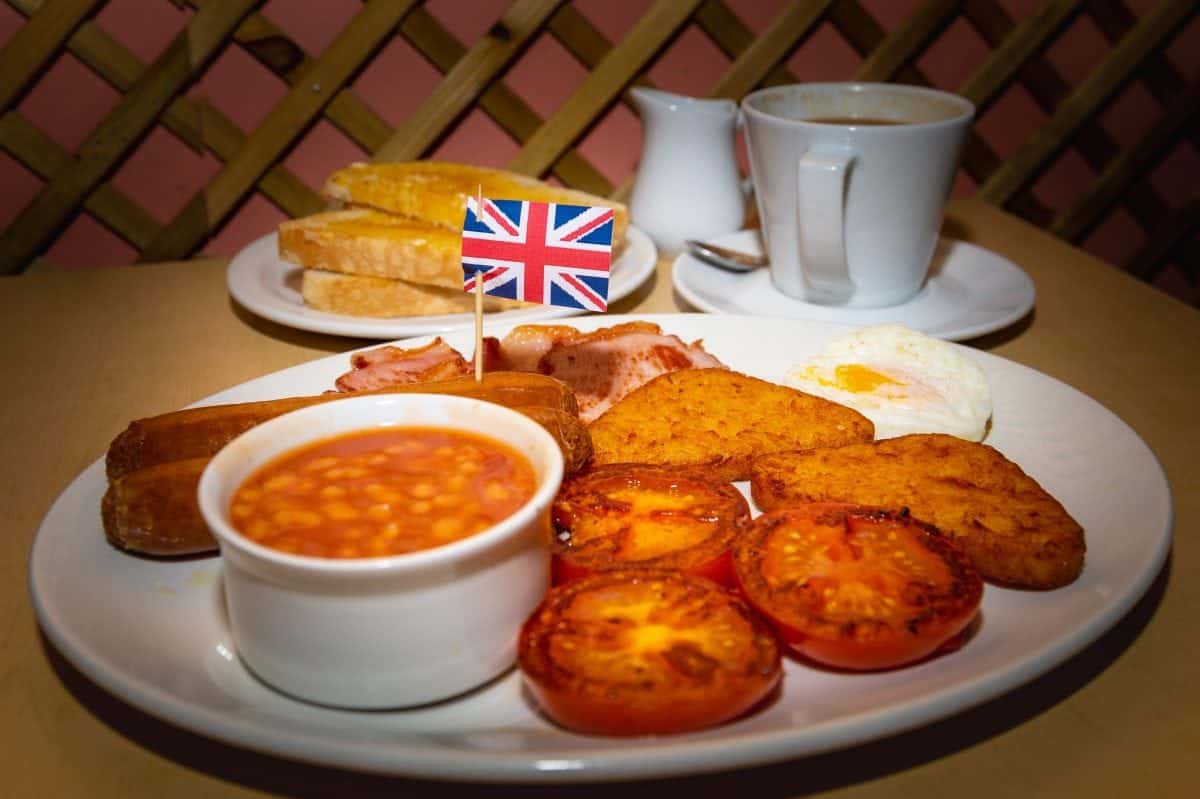Cafe being forced to close after online abuse about “racist” toothpicks stuck in Full English breakfasts – of a British Flag