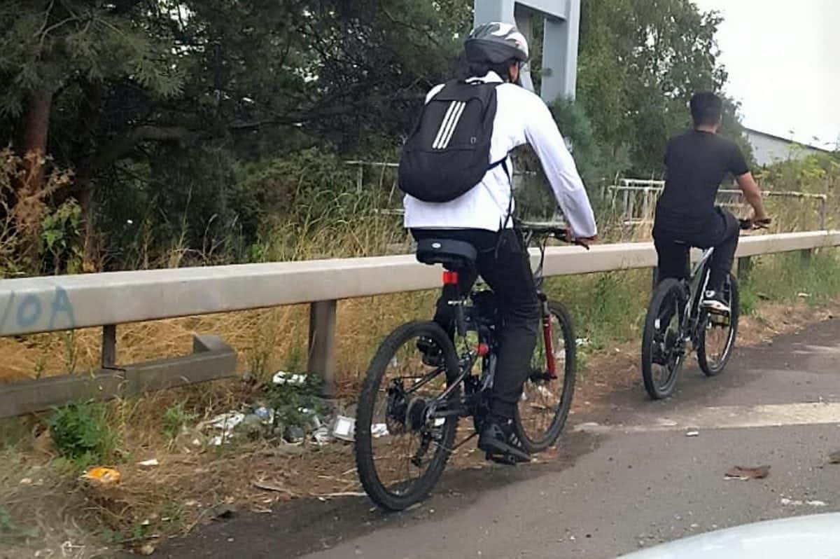 Two dopey teenagers snapped cycling along the M6 motorway after following an iPhone app