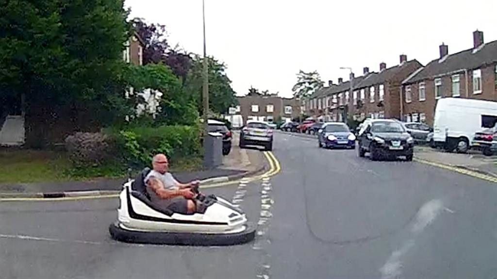 Watch – Dash cam captures fairground dodgem car driving on the ROAD