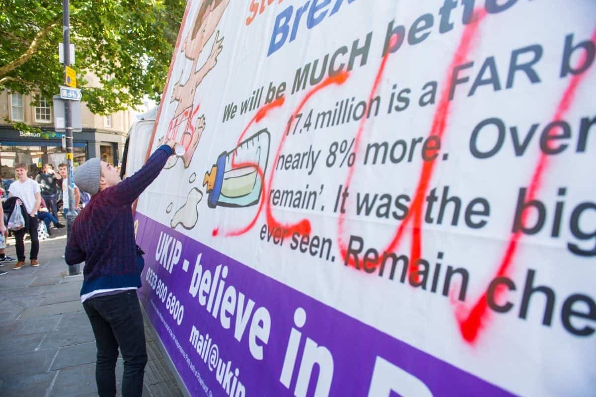 Protesters attack UKIP stall & mobile billboard with spray paint