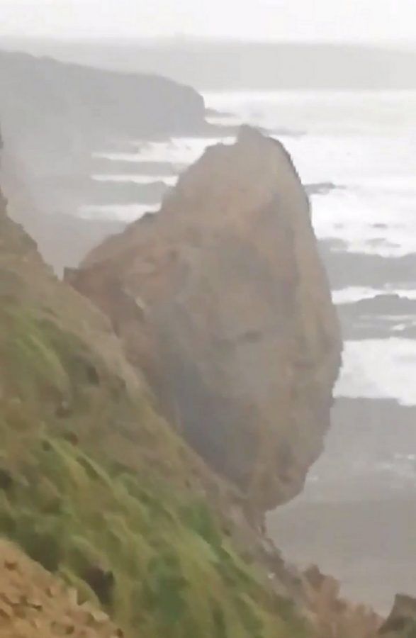 Watch – Terrifying footage shows enormous section of cliff collapsing onto beach below