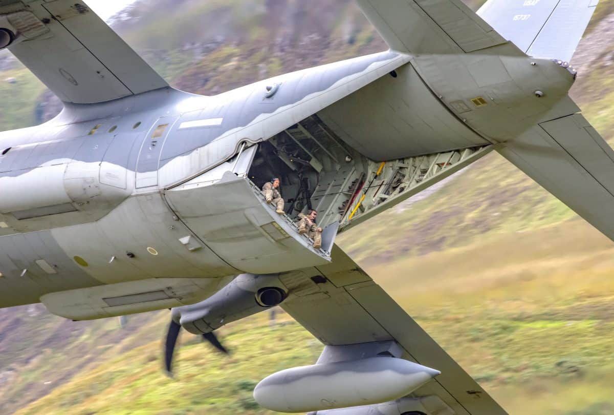 Photo of two American aircrew enjoying views across the British countryside