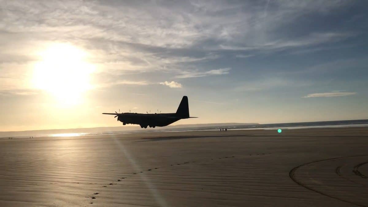 Video – Moment a Hercules plane lands on a British beach