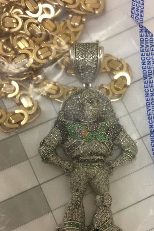 Dealer was busted with haul of crack cocaine, cash & blinged-out pendant of BUZZ LIGHTYEAR