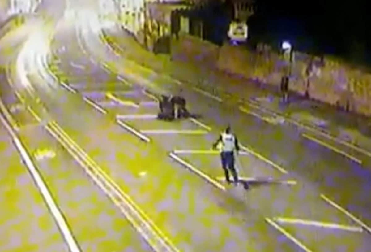 Watch – Police thank two have-a-go-hero pals captured on CCTV rugby tackling wanted man