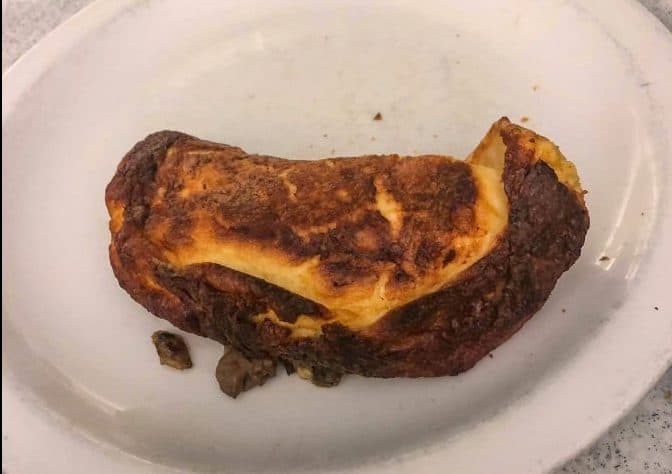 Hospital patient posts pic of mysterious plate of burned food & asked people to guess what it is