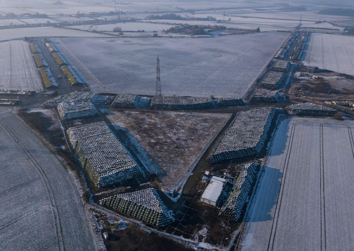 Photos show UK’s largest recycling mountain which was dumped over six years ago