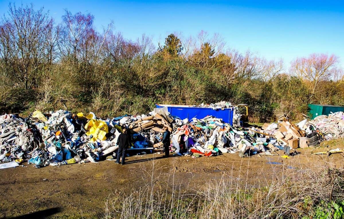 Mountains of rubbish dumped by flytippers “next door” to Surrey recycling centre