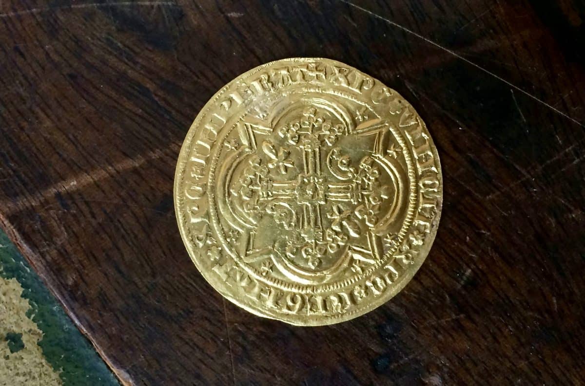 Auctioneers find 14th century French gold coin potentially worth thousands in secret drawer