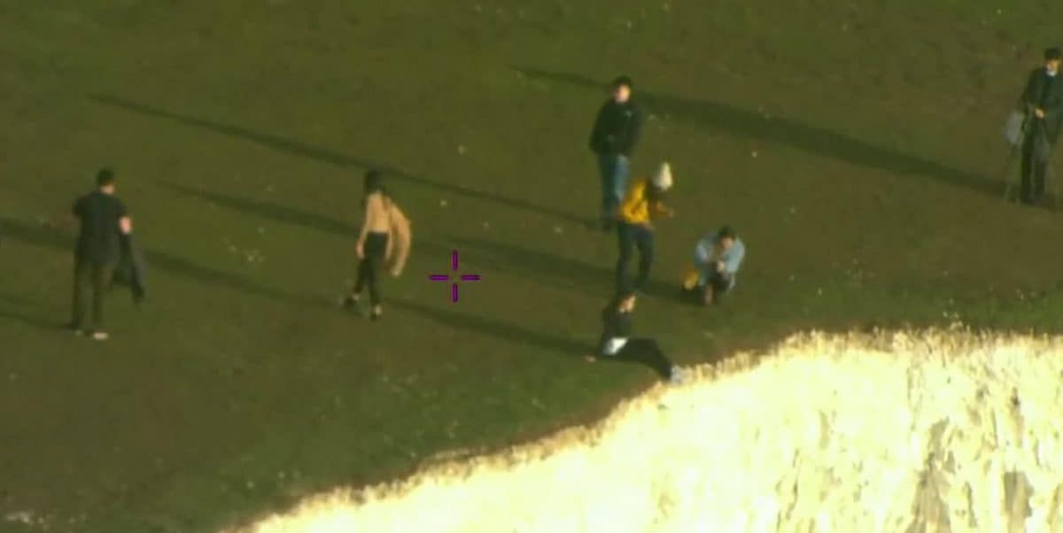 Tourists spotted dangling legs over Beachy Head at section that could collapse at any time