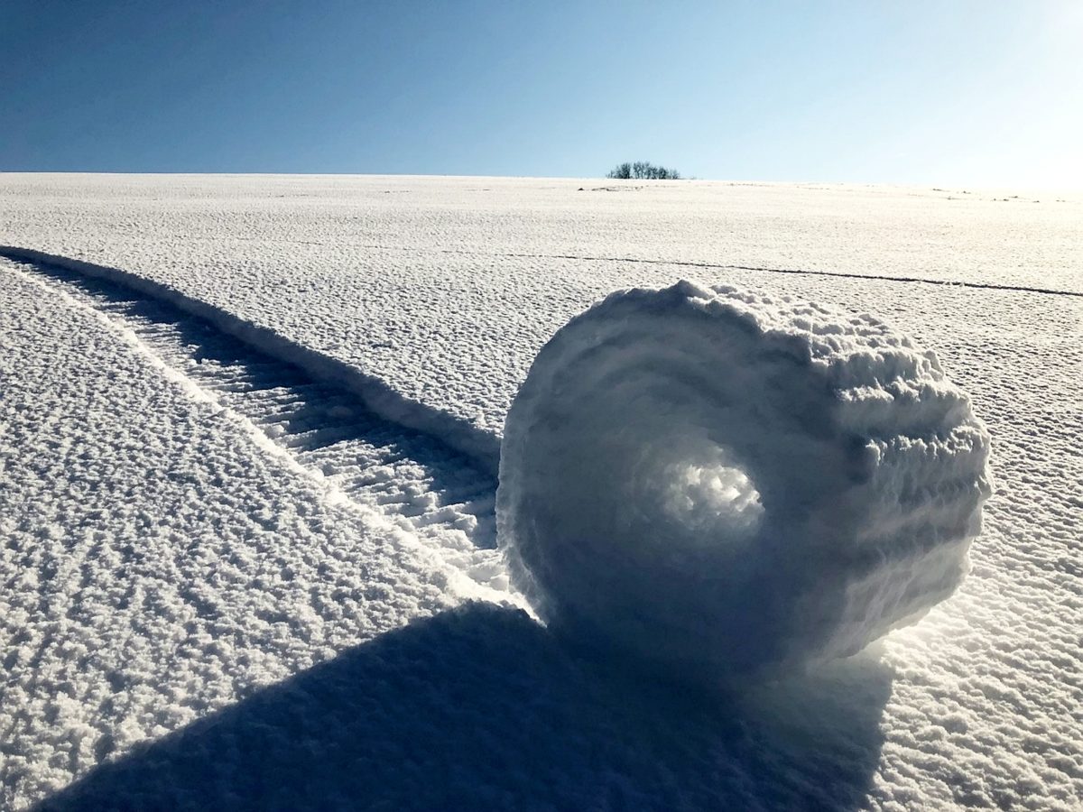 Amazing pictures show rare ‘snow rollers’ that formed in British field
