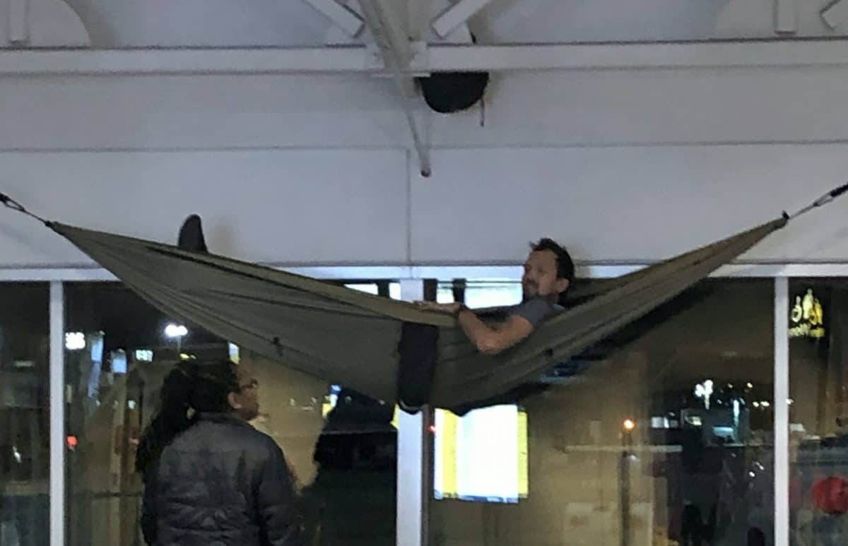 Holidaymaker hangs up HAMMOCK in airport while waiting for early morning flight