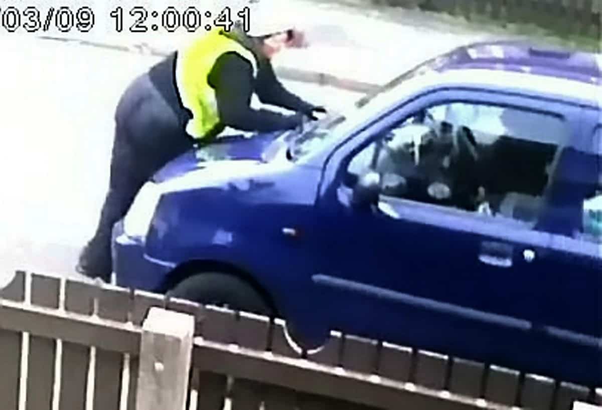 Shocking moment female delivery driver was run over by her own van