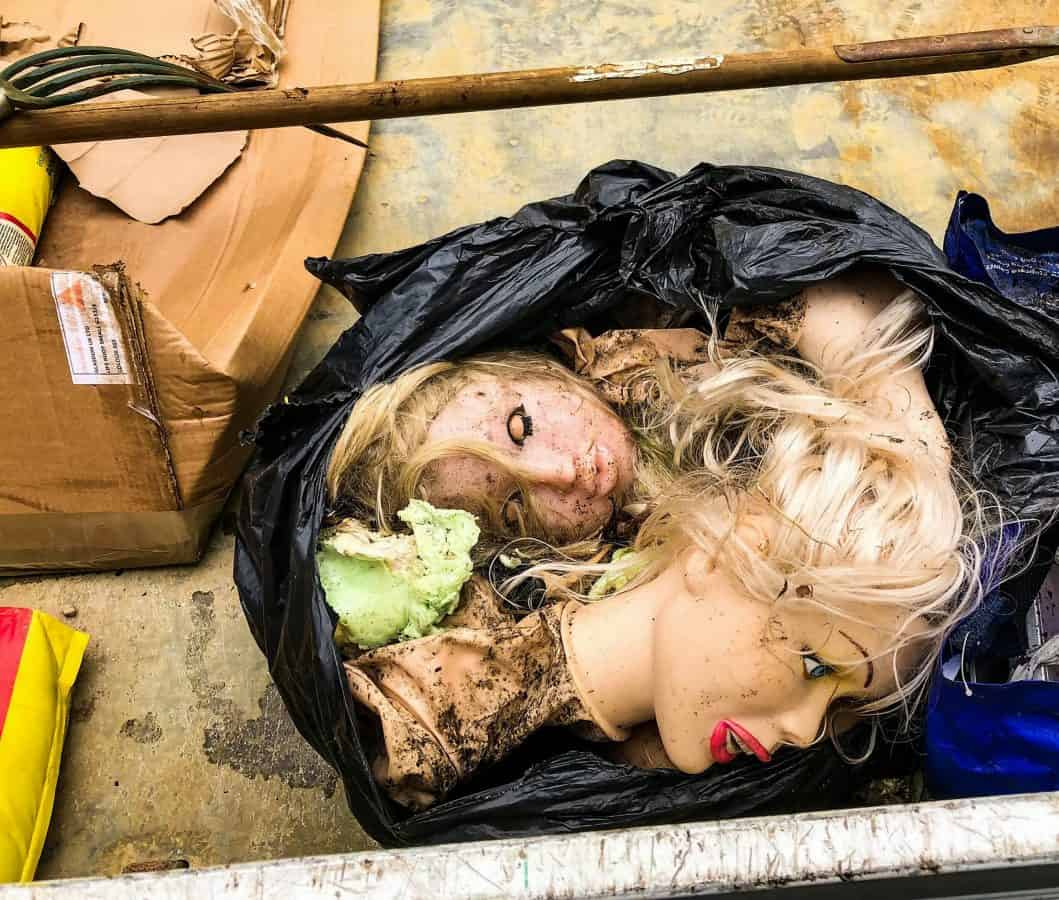 Police uncovered a black bin bag containing two heads – from deflated sex dolls