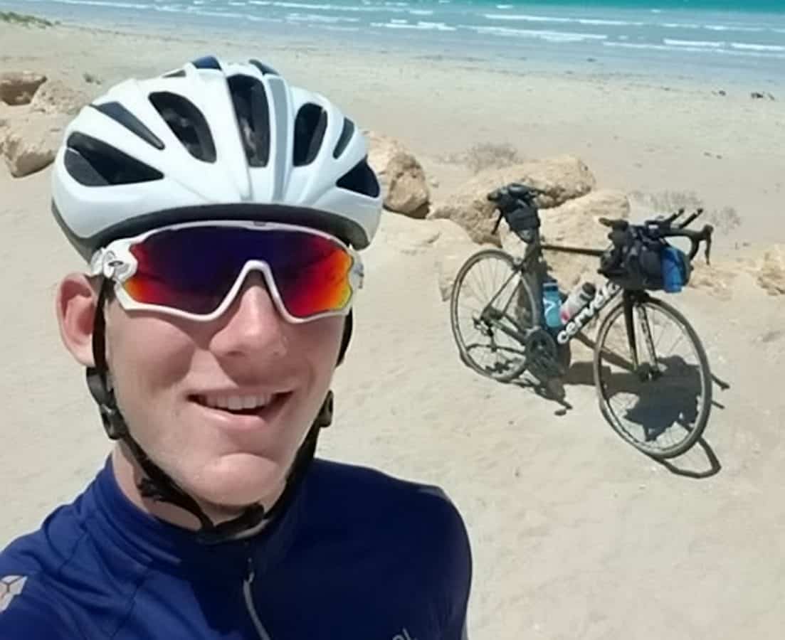 18-year-old Brit who is youngest person to cycle around the world solo returns home