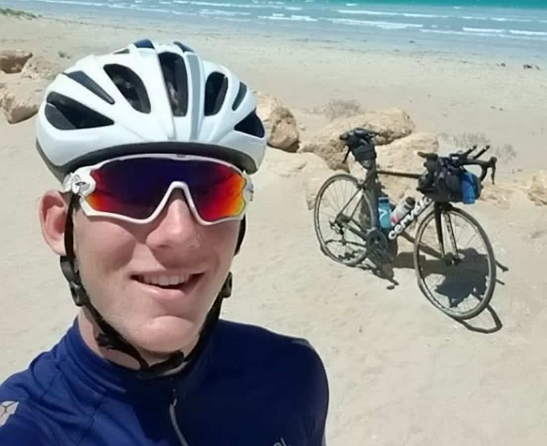 18-year-old Brit who is youngest person to cycle around the world solo returns home