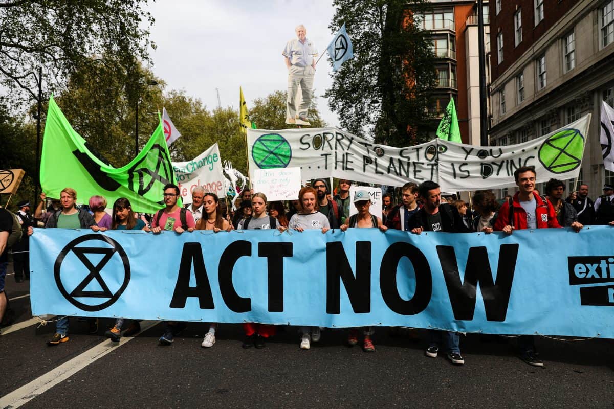 Extinction Rebellion activists accused of gluing themselves to DLR train to stand trial