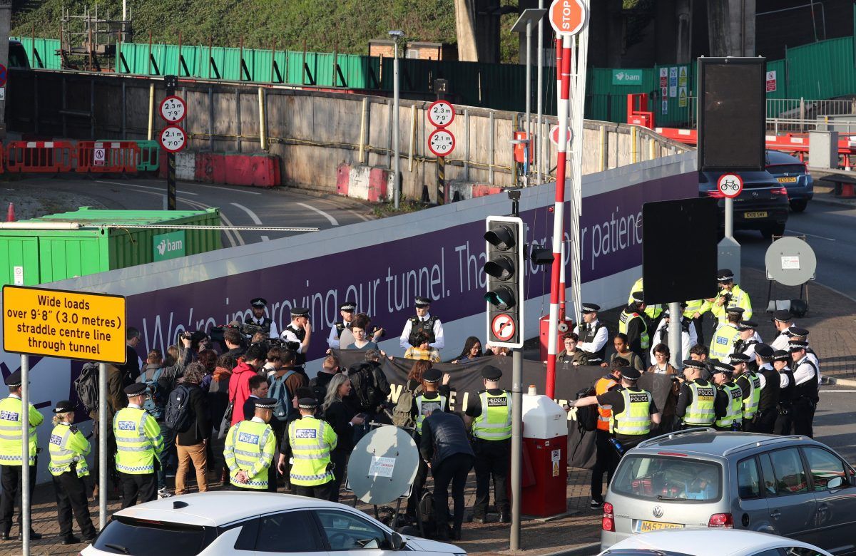 climate protestors at Heathrow (c) SWNS