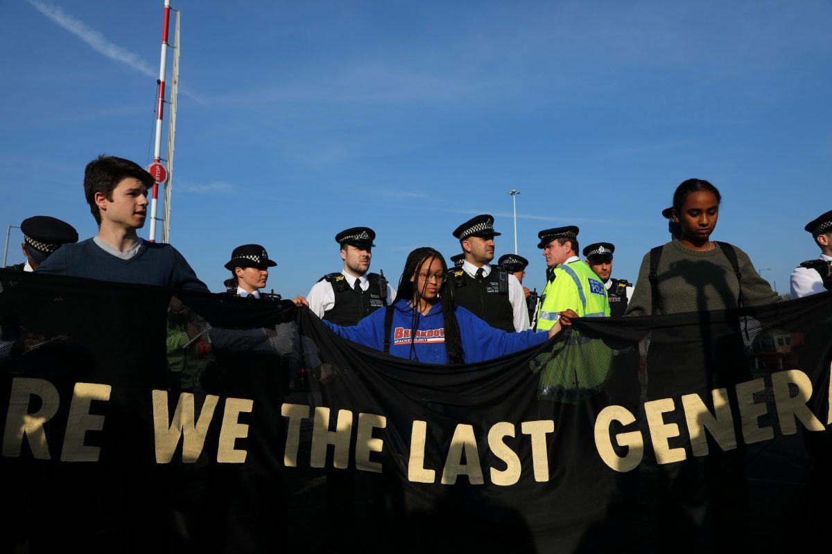 climate protestors at Heathrow (c) SWNS