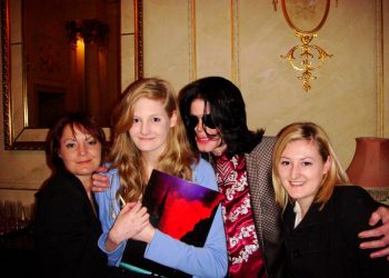 Lucy Lester, right, has defended godfather Michael Jackson, second right, against allegations of sex abuse in recent documentary Leaving Neverland. Also pictured are Lucy's mother Lisa, far left, and sister Harriet, second left. They are pictured with the star in London in March 2009 months before his death